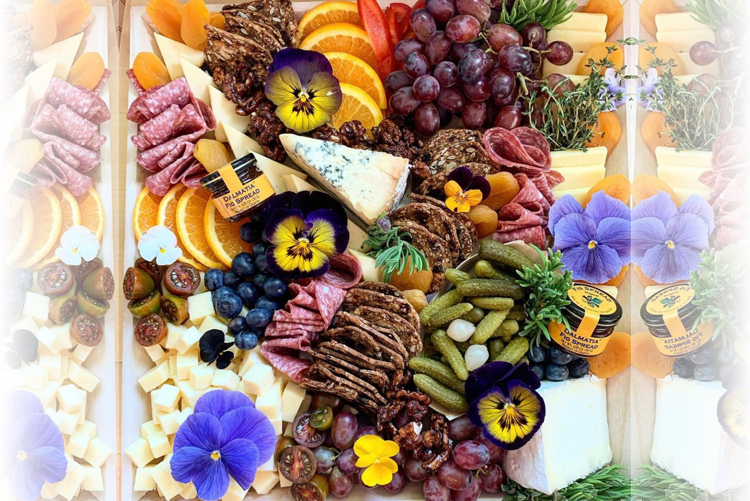 Grapes and Gourmet curates boards packed with sweet and savory snacks