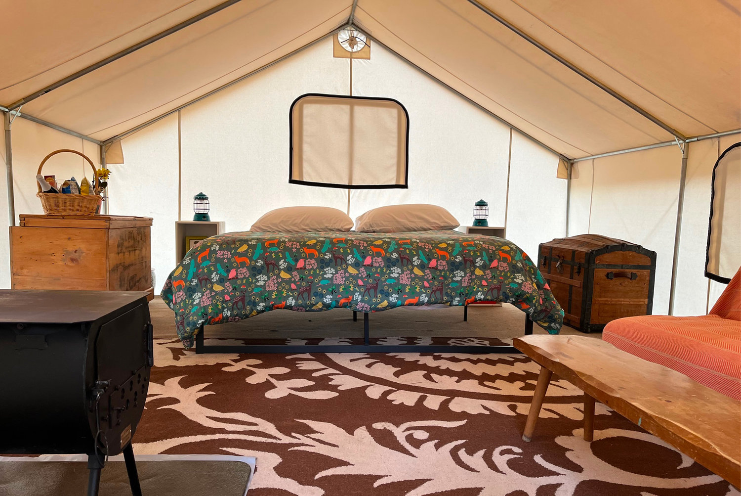 Leave the sleeping bags rolled up at home – each tent has a bed complete with bedding. Other amenities include cooking pans, outdoor seating, and use of a canoe.