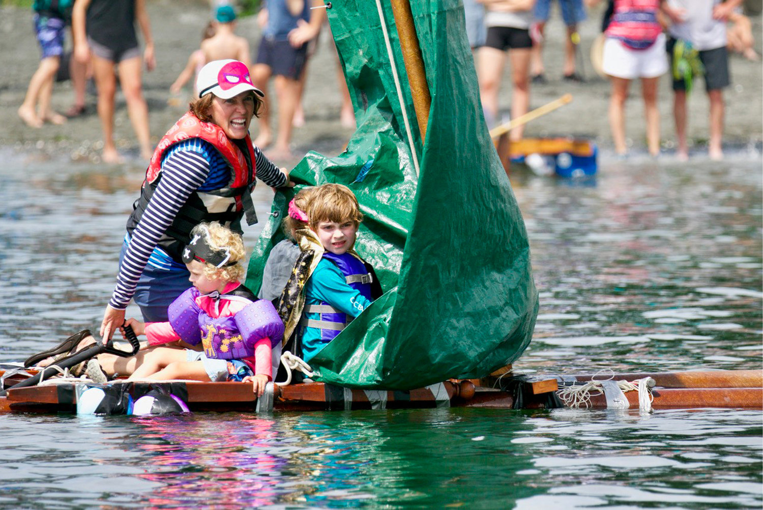 Participants sink or swim aboard their crafty vessels for the Fools’ Rules Regatta