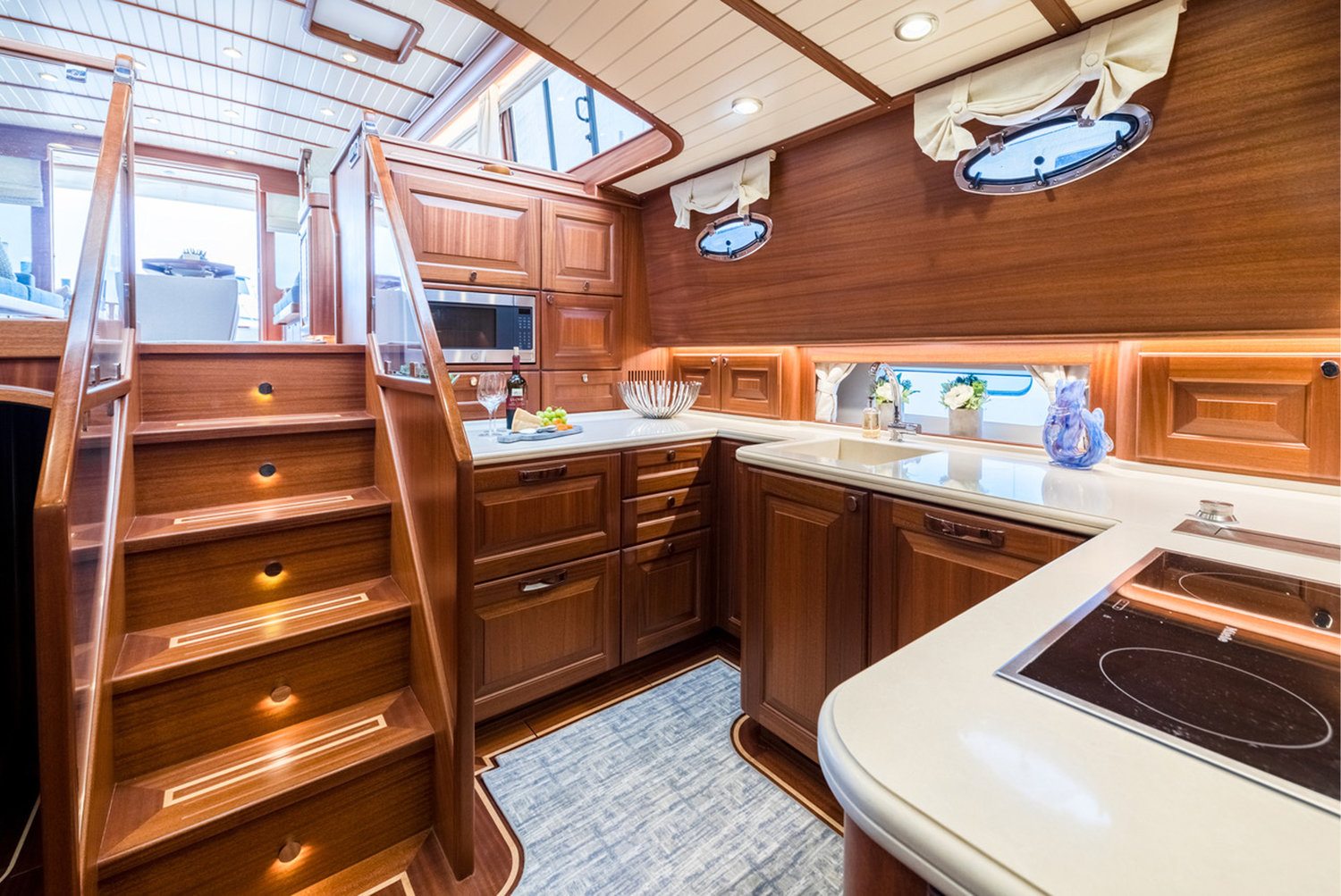 The galley and accommodations live on the lower deck