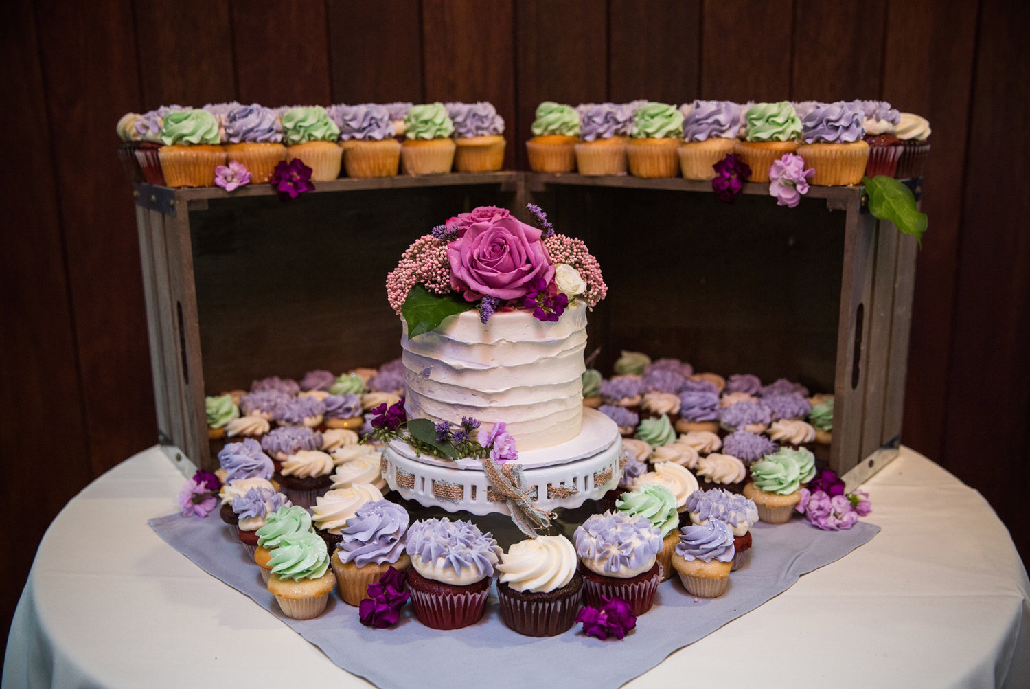 Can’t part with cake entirely? A small one surrounded by festive cupcakes from Silver Spoon Bakery is a must